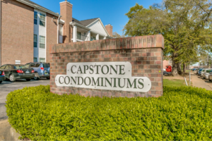 Entrance sign to Capstone Condos